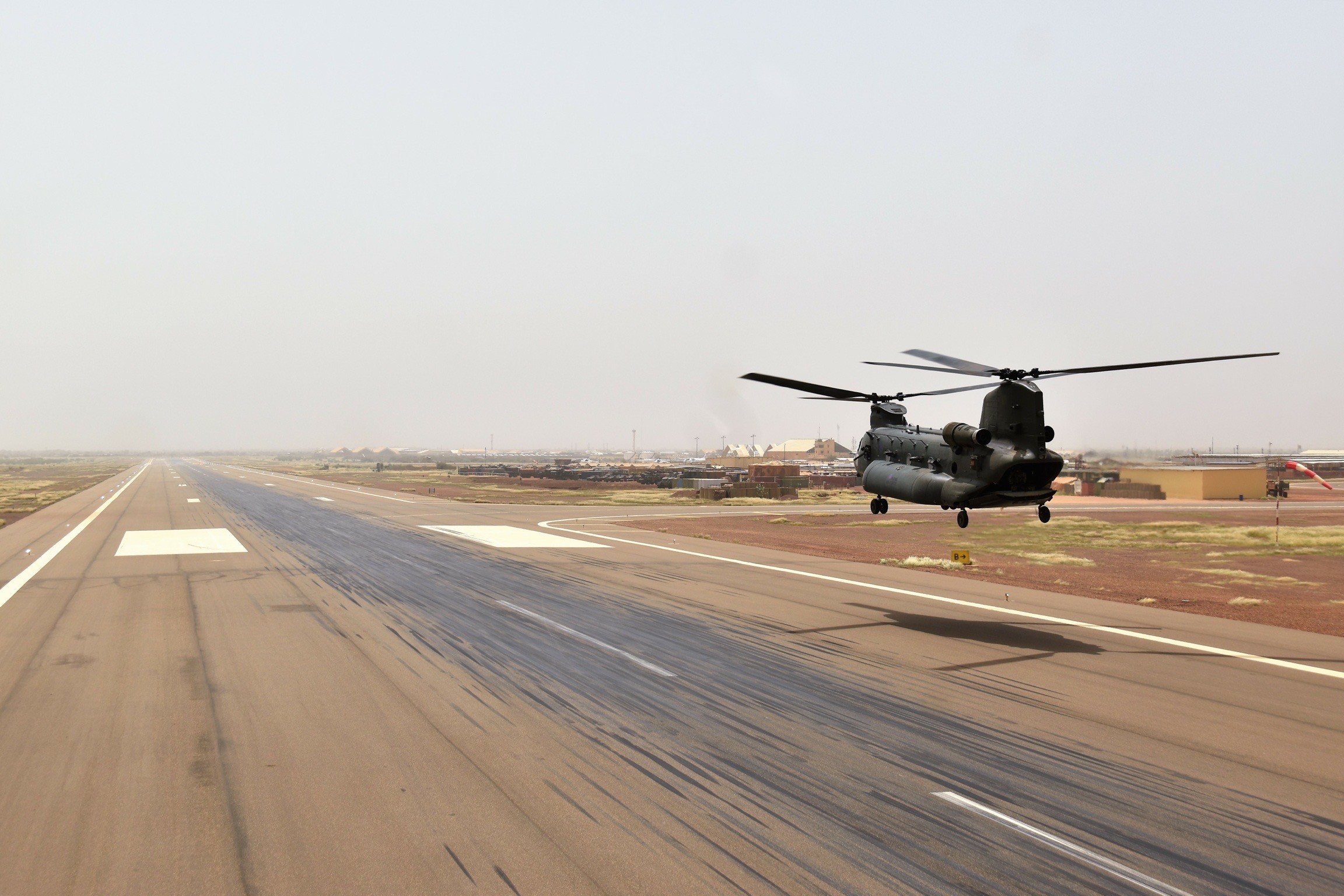 Chinook flying low over the runway in Mali.